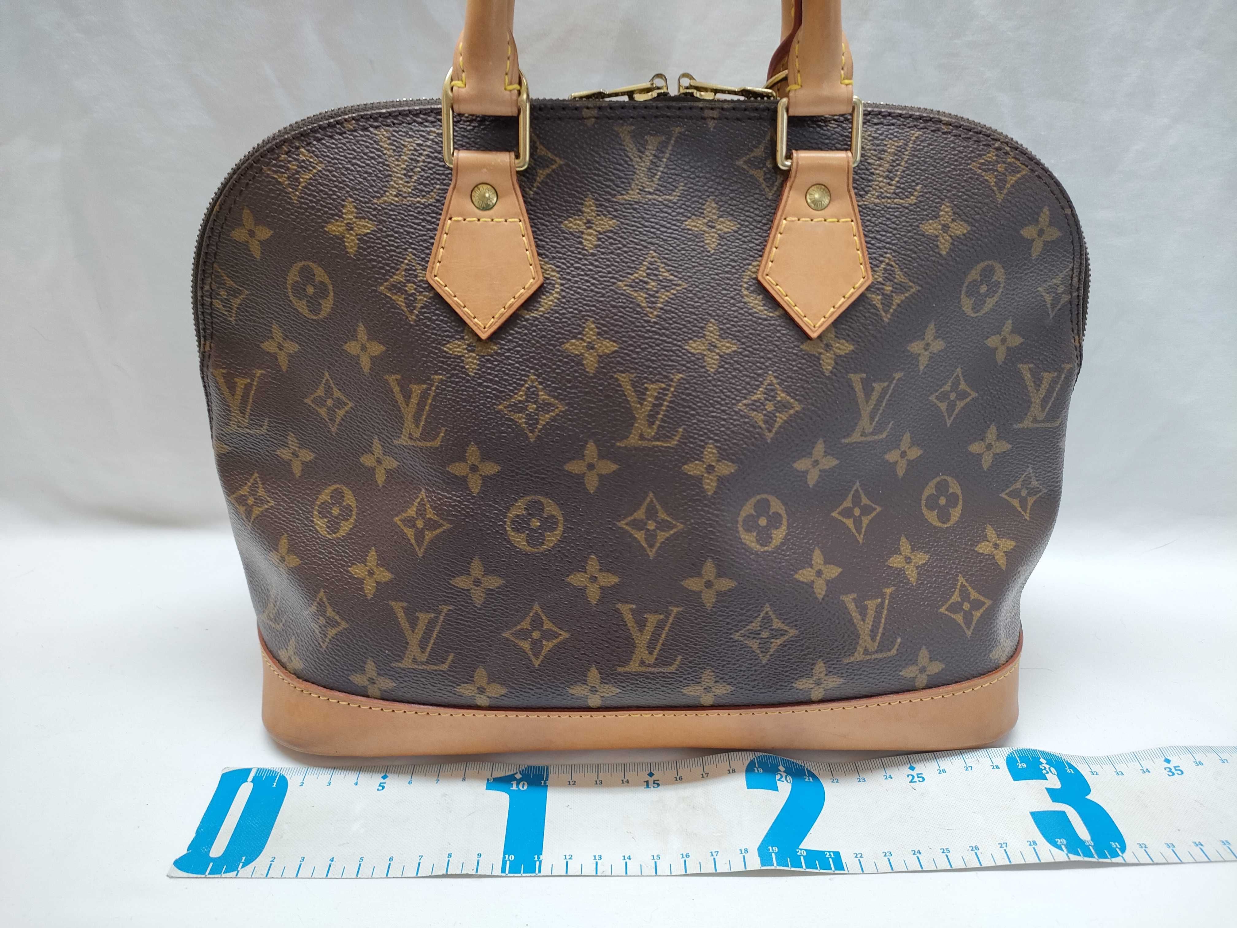Louis Vuitton Monogram Alma PM Brown Coated Canvas Handbag