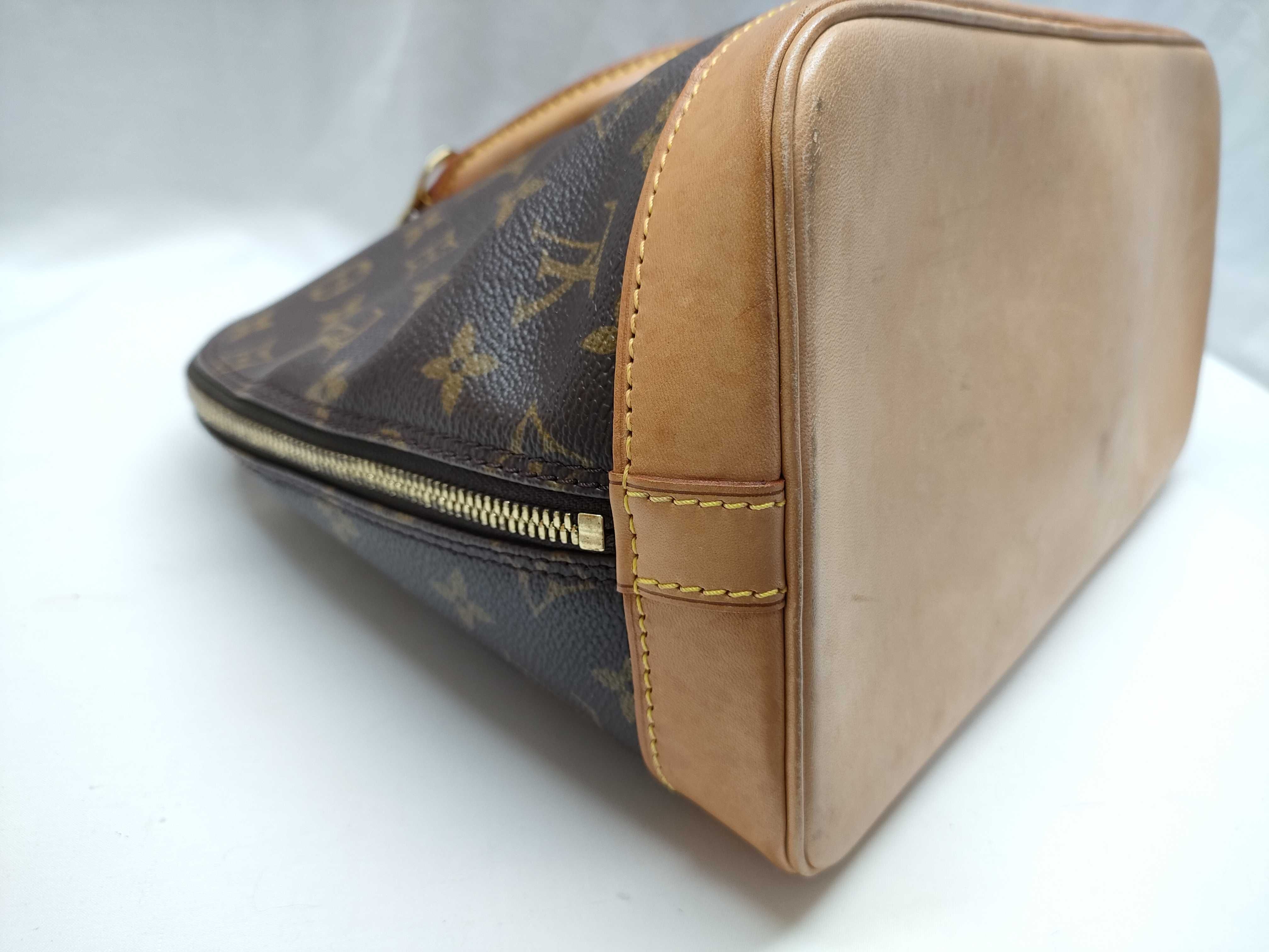 Louis Vuitton Monogram Alma PM Brown Coated Canvas Handbag