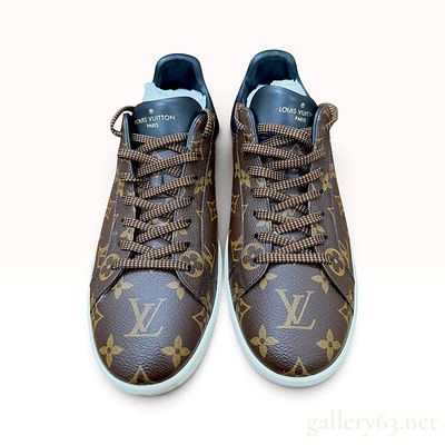 Louis Vuitton Luxembourg Monogram Canvas and Black Leather Sneakers size 10. A pair of Louis 