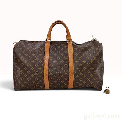 Vintage Louis Vuitton Monogram Keepall 55 Travel Bag. This is a Louis Vuitton Keepall 55 travel 