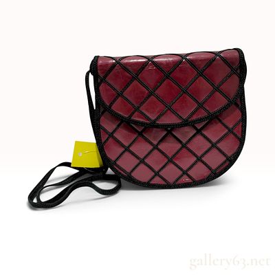 Vintage Yves Saint Laurent Lattice Overlay Burgundy Leather Saddle Bag. This Yves Saint Laurent 