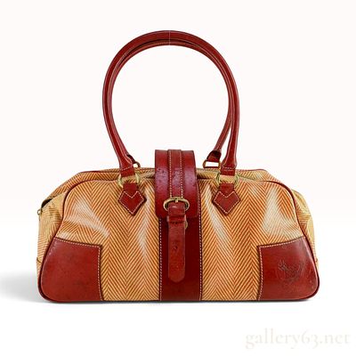 Vintage Vivienne Westwood Coated Canvas and Leather Boston Bag. A Vivienne Westwood Boston 