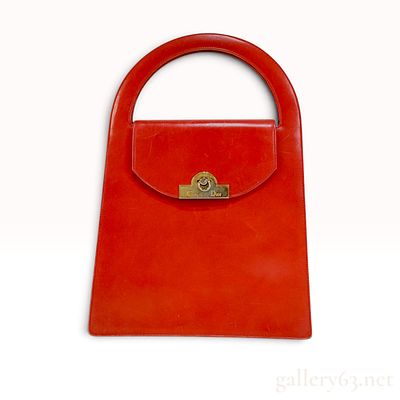 Vintage Christian Dior Red Leather Top Handle Handbag. This Christian Dior handbag is crafted 