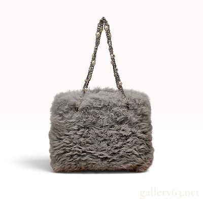 Miu Miu Grey Shearling Crystal and Pearl Chain Tote Bag. This Miu Miu shoulder tote is crafted 