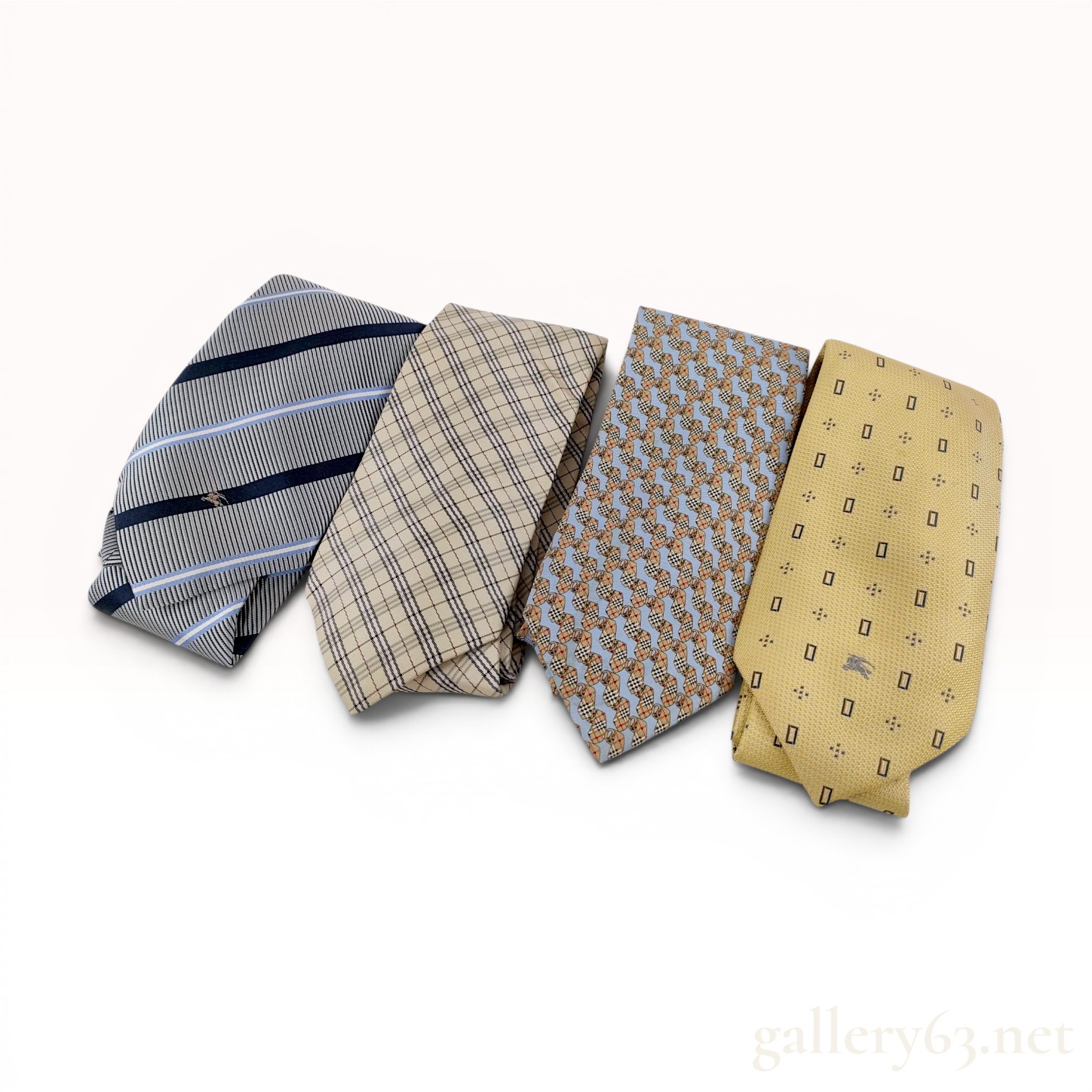 Collection of Burberry Silk Ties Featuring Black Label and London Patterns