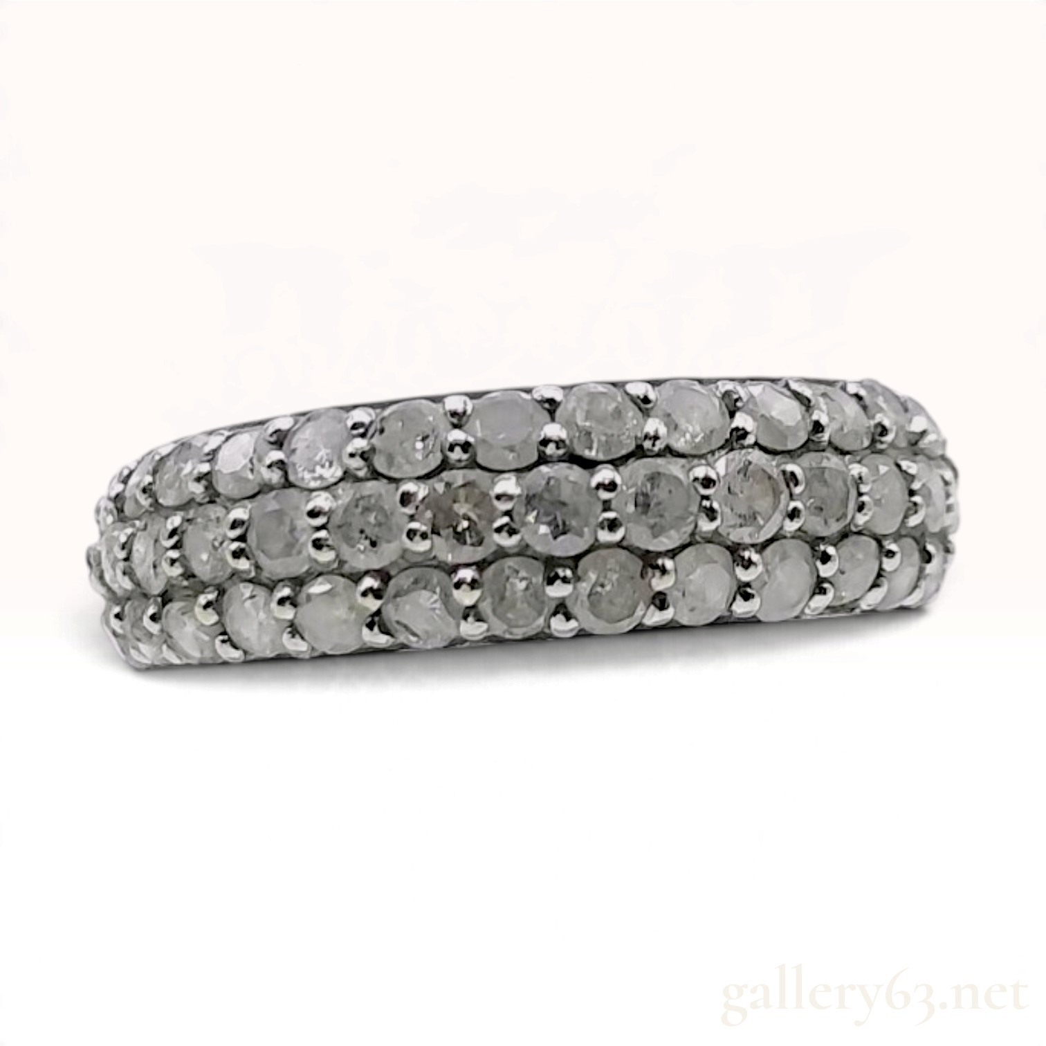 An 18 Karat Yellow Gold and 1.00ctw Triple Row Diamond Pave Band