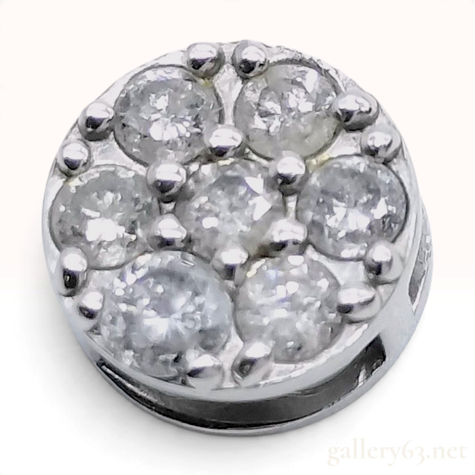 A Platinum and 0.30ctw Diamond Flower Cluster Pendant