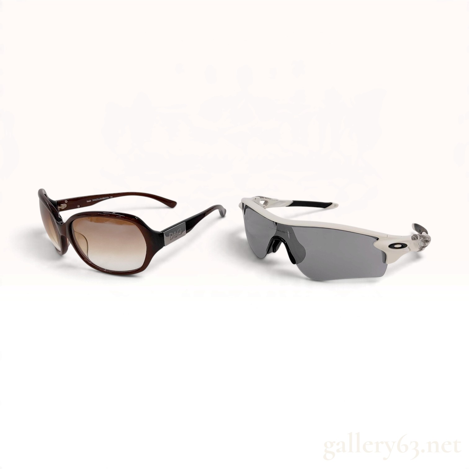 Two Pairs of Designer Sunglasses Including Dolce & Gabbana and Oakley