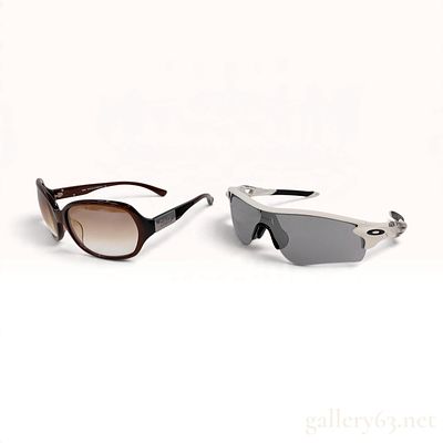 Two Pairs of Designer Sunglasses Including Dolce & Gabbana and Oakley. This lot features two 