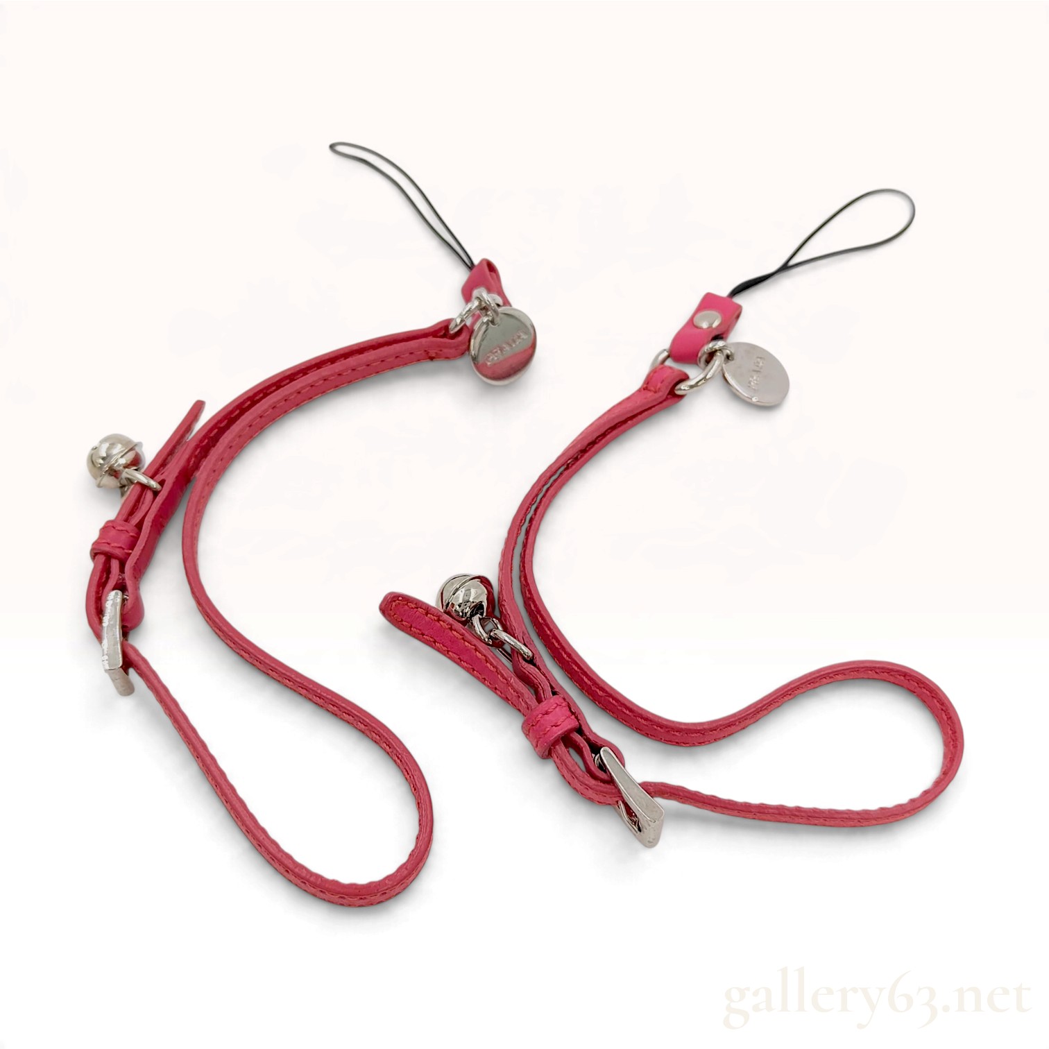 A Pair of Prada Peonia Pink Saffiano Leather Accessory Charms