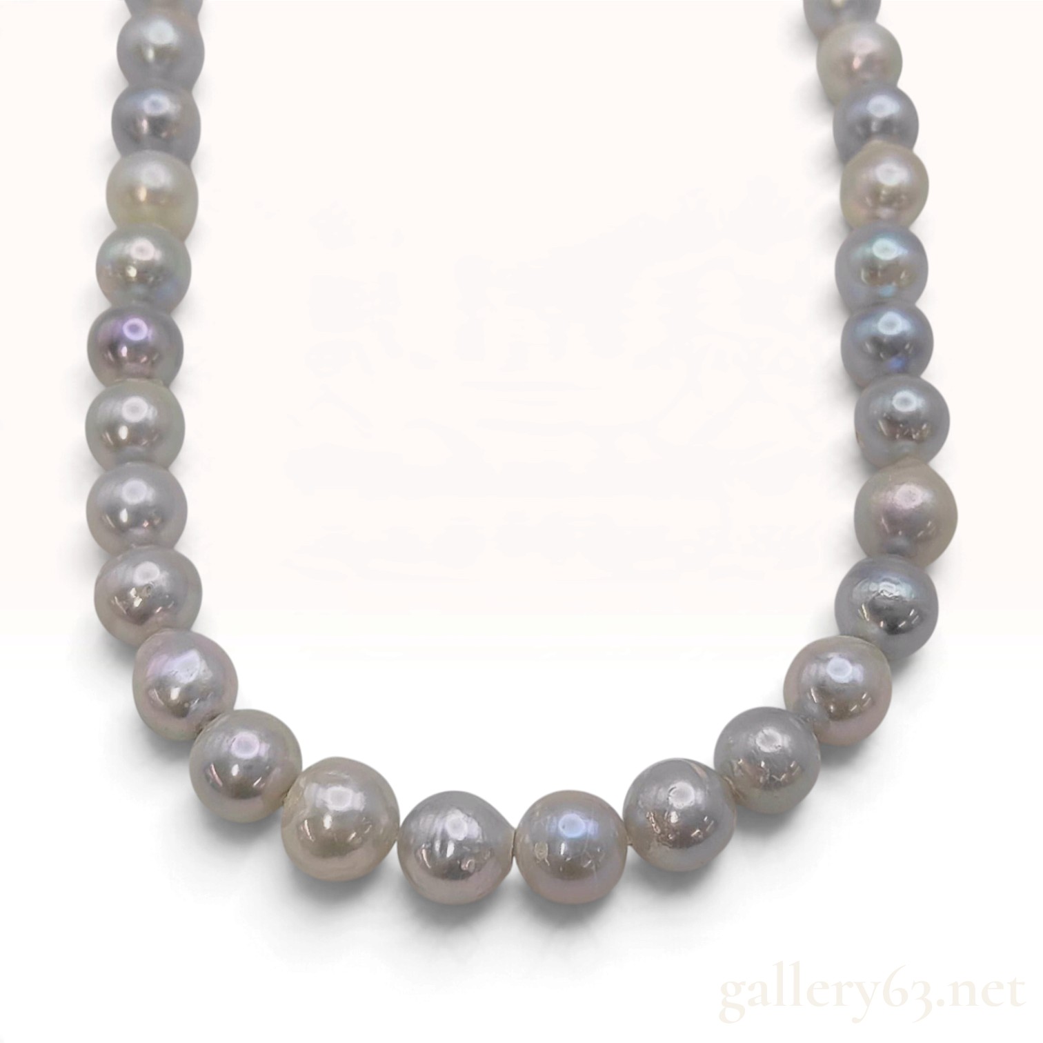 A Graduated Blue Gray Baroque Akoya Pearl Necklace with Silver Floral Clasp