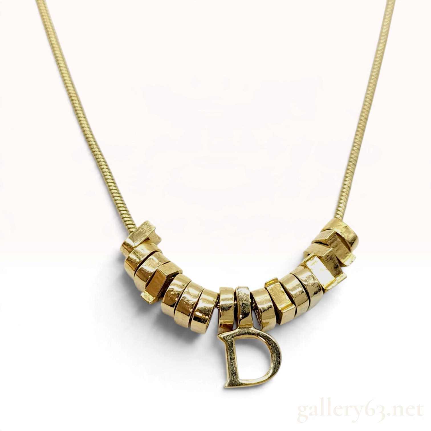 Christian Dior Gold Tone Sliders and D Pendant Snake Chain Necklace