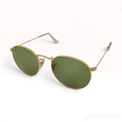 Vintage Bausch & Lomb Ray-Ban Gold Oval Sunglasses with Case. These vintage Ray-Ban sunglasses 
