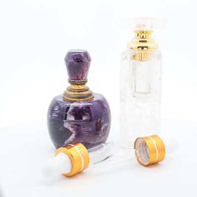 Set of 2 Carved Rock Crystal & Amethyst Perfume Bottles. Set of 2 Carved Rock Crystal &