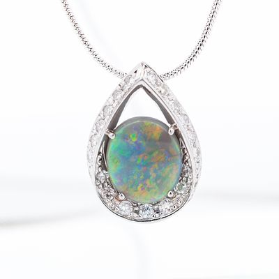 Fantastic Platinum 2.38ct Black Opal & 0.64ct Diamond Teardrop Pendant. Round cabochon black