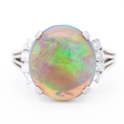 Platinum 4.04ct Opal & Natural Diamond Ring, size 6. From jewelry store with $2,999.00 retail 