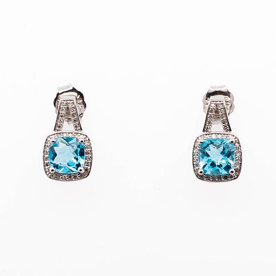 14K WG Blue Topaz & Diamond Earrings. 6.00mm cushion cut blue topaz &amp; .21ctw diamond 