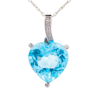 14K WG Blue Topaz & Diamond Pendant Necklace 18". 14k white gold pendant featuring an 11.00 mm 