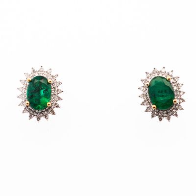 14K WG Emerald & Diamond Halo Earrings. A beautiful pair of 14k white gold emerald halo earrings 