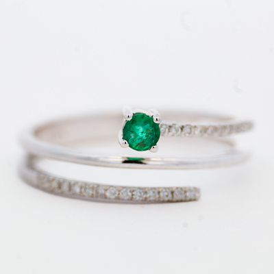 14K WG Emerald & Diamond Ring, size 6.75. Solid 14k white gold wraparound ring with pave set 