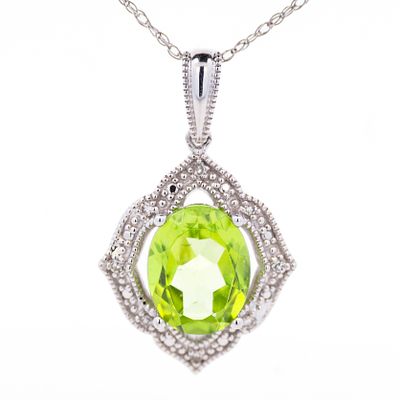14K WG Peridot & Diamond Pendant. You're getting an 18 inch 14k white gold necklace and a solid 