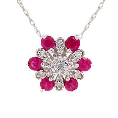 14K WG Ruby & Diamond Pendant 18". A 14k white gold flower-style pendant set with rubies and 