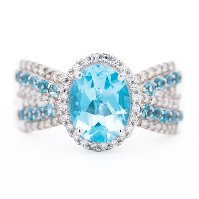 14K WG Swiss Blue Topaz & Diamond Ring, size 7. 14K white gold ladies dress ring weighing 5.23 