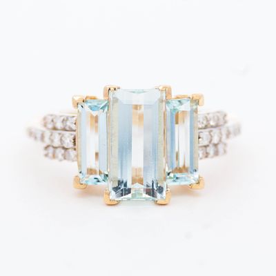 14K YG Aquamarine & Diamond Ring, size 7. 14K yellow gold ring weighing 4.2 grams. Three 