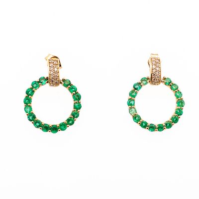 14K YG Emerald & Diamond Door Knocker Earrings. A pair of 14k yellow gold door-knocker style 