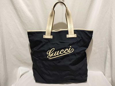 Gucci Script Nylon Tote. Authentic Gucci tote bag W44 x H37 X D18cm. somewhere between navy and 