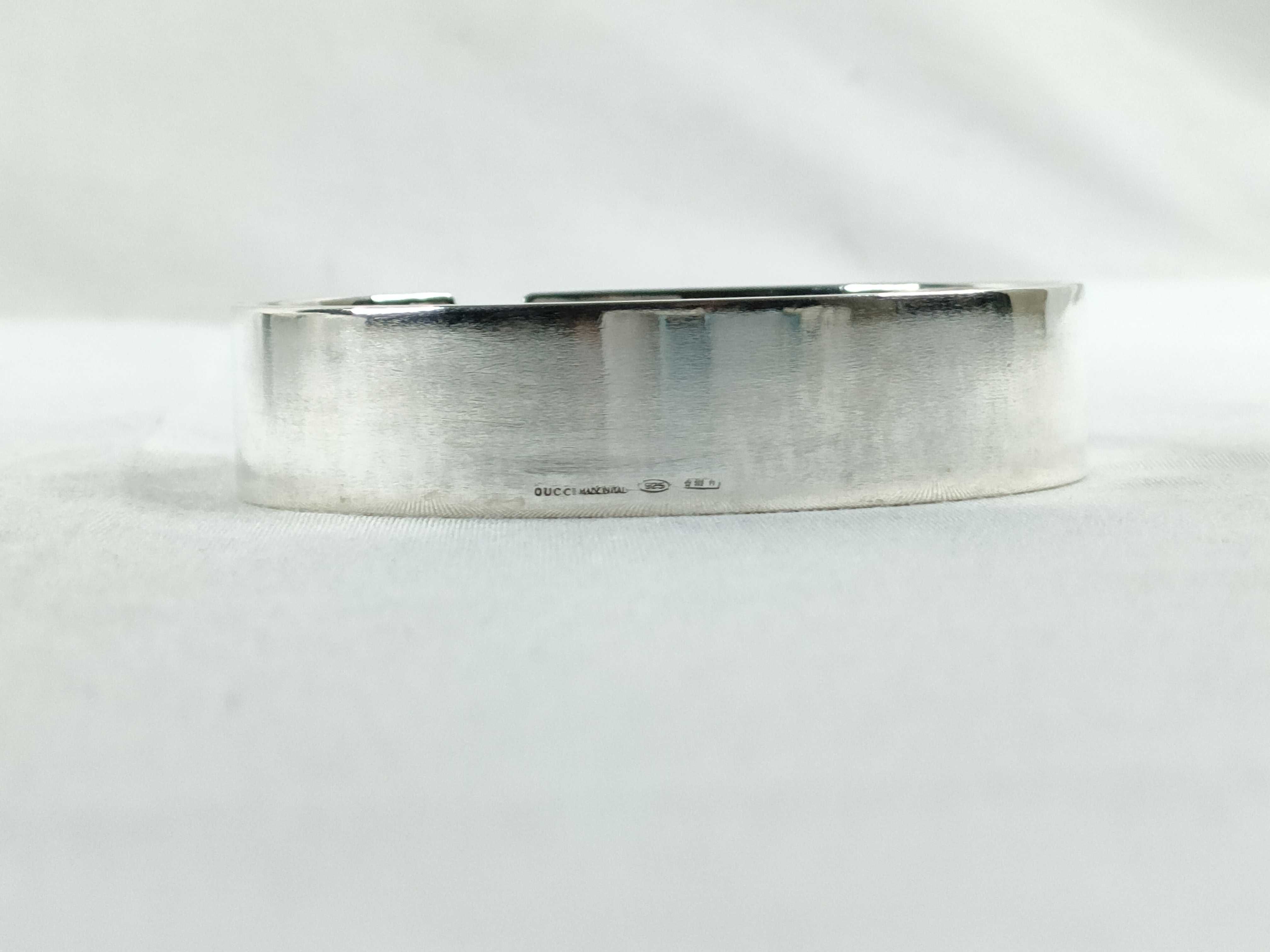 Lot 168 - Gucci Sterling Silver Cutout Bangle | Gallery 63 Luxury
