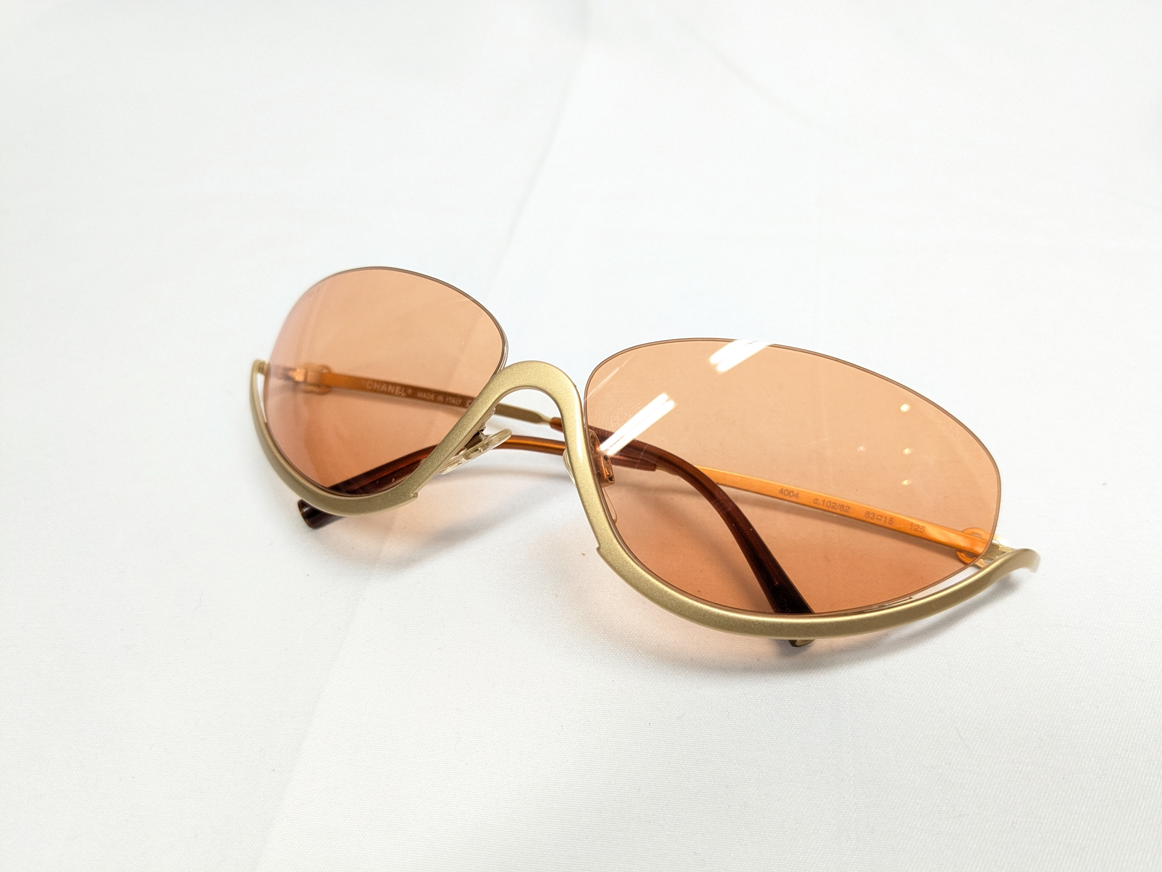 Lot 204 - Pair of Vintage Chanel Sunglasses, Gold-tone frame 