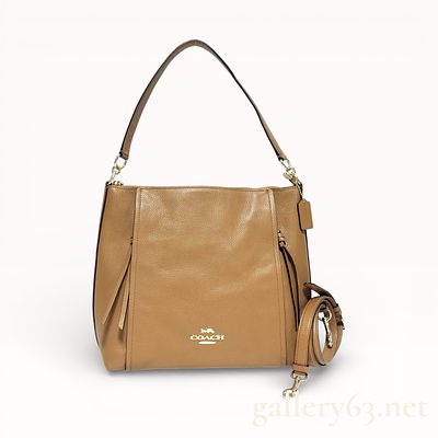 Coach Tan Leather 2-Way Shoulder Bag. Coach shoulder bag crafted of tan leather. Bag having a 