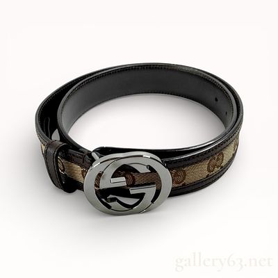 Gucci GG Canvas and Leather Belt 114874. Authentic Gucci belt featuring GG monogram canvas set 