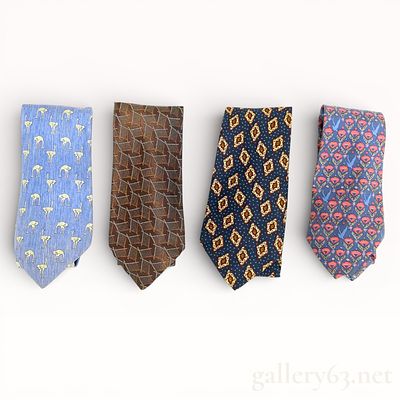 Herm&egrave;s and Chanel Silk Tie Set of Four. Mixed-brand tie set featuring four silk neckties by 