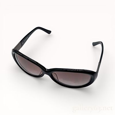 Bvlgari 8062 Black Acetate Sunglasses. Authentic Bvlgari sunglasses featuring a slim oval frame 