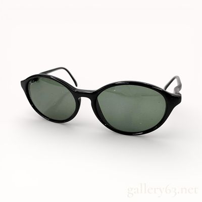 Ray-Ban B&L W1945 Oval Sunglasses. Authentic Ray-Ban Vintage sunglasses featuring an oval black 