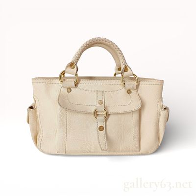 Celine Boogie handbag in Ivory Pebbled Leather with gold-tone hardware. Authentic Celine Boogie 