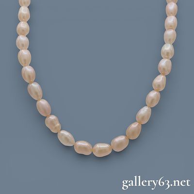 Sterling Silver Freshwater Pearl Necklace. Sterling silver necklace featuring a strand of 