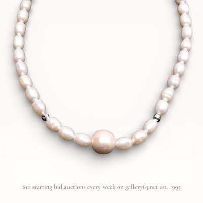 Graduated 7mm Pearl Necklace with Central 11mm Pearl with Silver Hardware. Beaded pearl necklace 