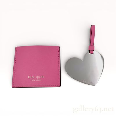 Kate Spade Pink Leather Coin Pouch with Heart-Shaped Mirror Charm. Kate Spade coin pouch crafted 