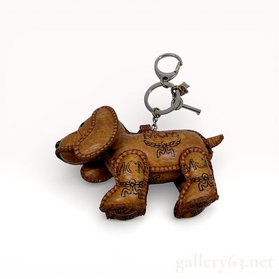 MCM Visetos Leather Dog Keychain Charm. Authentic MCM keychain charm having a dog-shaped form 