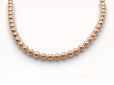 18K Yellow Gold 5.6mm Tasaki Strand of Champagne Pearls. Necklace built from a string of 