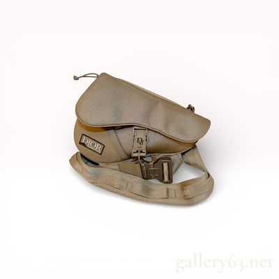 Dior x Mystery Ranch Saddle Shoulder Bag Featuring Technical Strap and Logo Hardware. this is a 