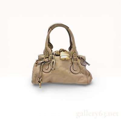 Chlo&eacute; Paddington Beige Leather Satchel Bag Featuring Oversized Padlock Hardware. The Chlo&eacute; 