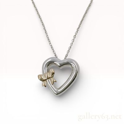 Tiffany & Co. Ribbon Heart Pendant Necklace in Sterling Silver and 18k Yellow Gold. Tiffany 
