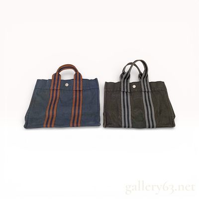 Hermes Fourre Tout PM Set of 2. Authentic Hermes tote set having two canvas handbags featuring 