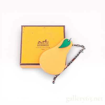 Hermes Pear Fruit Motif Leather Charm with Chain. Authentic Hermes charm crafted from smooth tan 