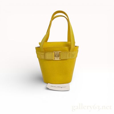 Salvatore Ferragamo Vara handbag in bright yellow python textured leather. Salvatore Ferragamo 