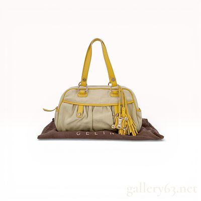 Celine Triomphe Canvas and Leather Satchel Bag. Celine handbag having a soft rectangular body 